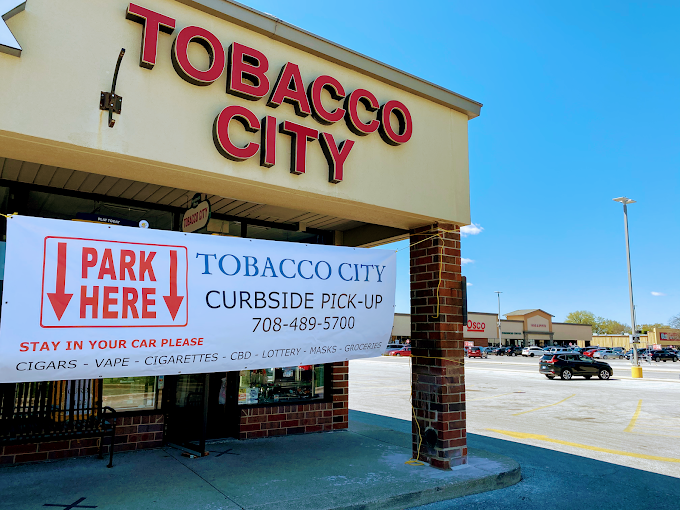 Tobacco City -Merrionette Park Logo