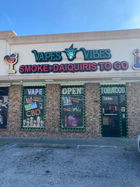 Vape & Vibes Smoke Shop Logo