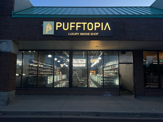 Pufftopia Luxury Smoke Shop Logo