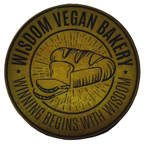 Wisdom Vegan Bakery & Cafe Logo