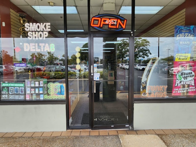 Bald Guy Smoke Shop 2 Logo