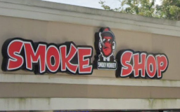 Smokey Monkey Smoke Shop Logo