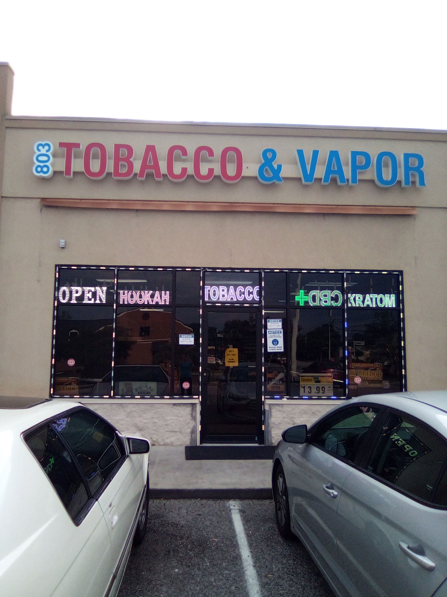 803 TOBACCO & VAPOR - Manning Logo