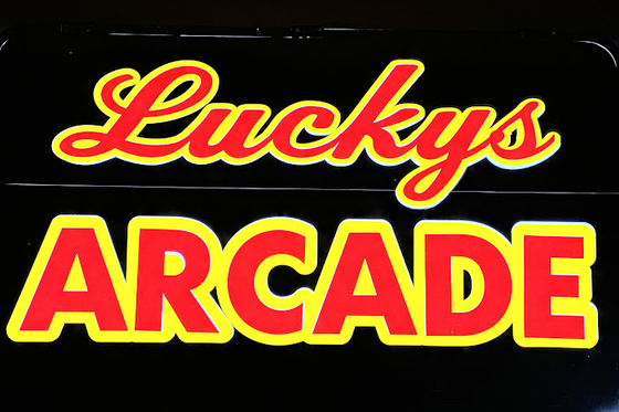 Luckys Cafe Arcade - Tavares Logo