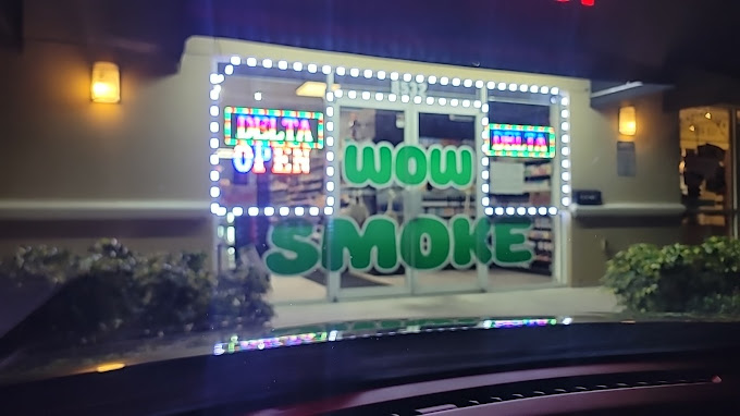 Wow Smoke Shop Logo