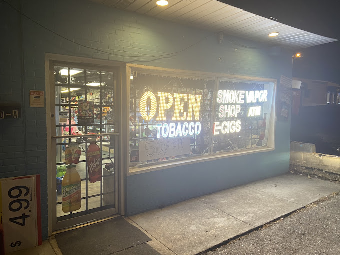 OG Hustler Smoke Shop #4 Logo